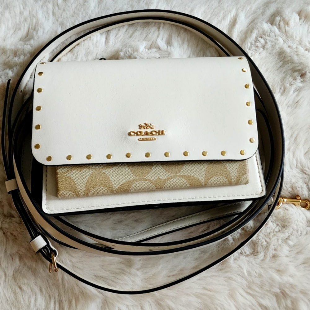 Coach white and snake print purse can be worn like belt bag